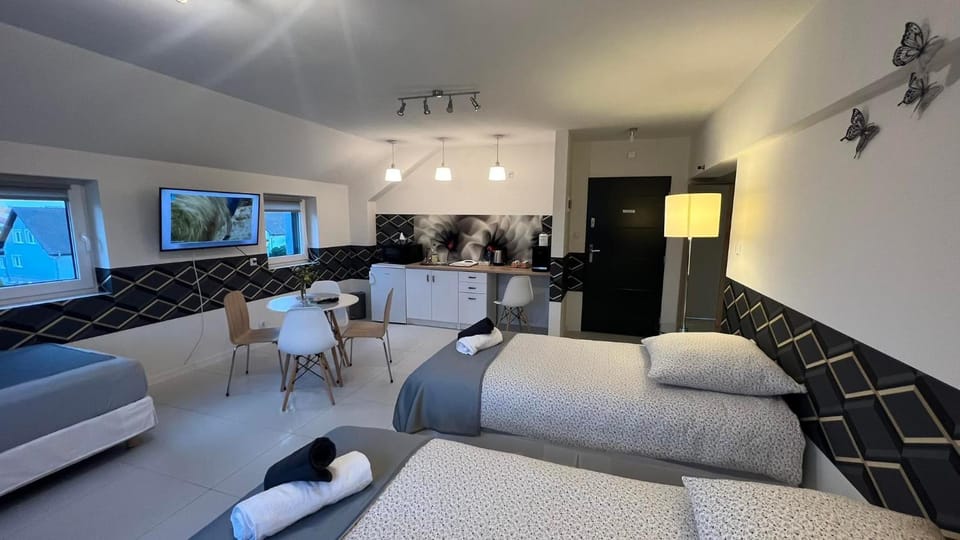 Bed, TV and multimedia, Coffee/tea facilities, Kitchen or kitchenette, Living room, minibar, towels