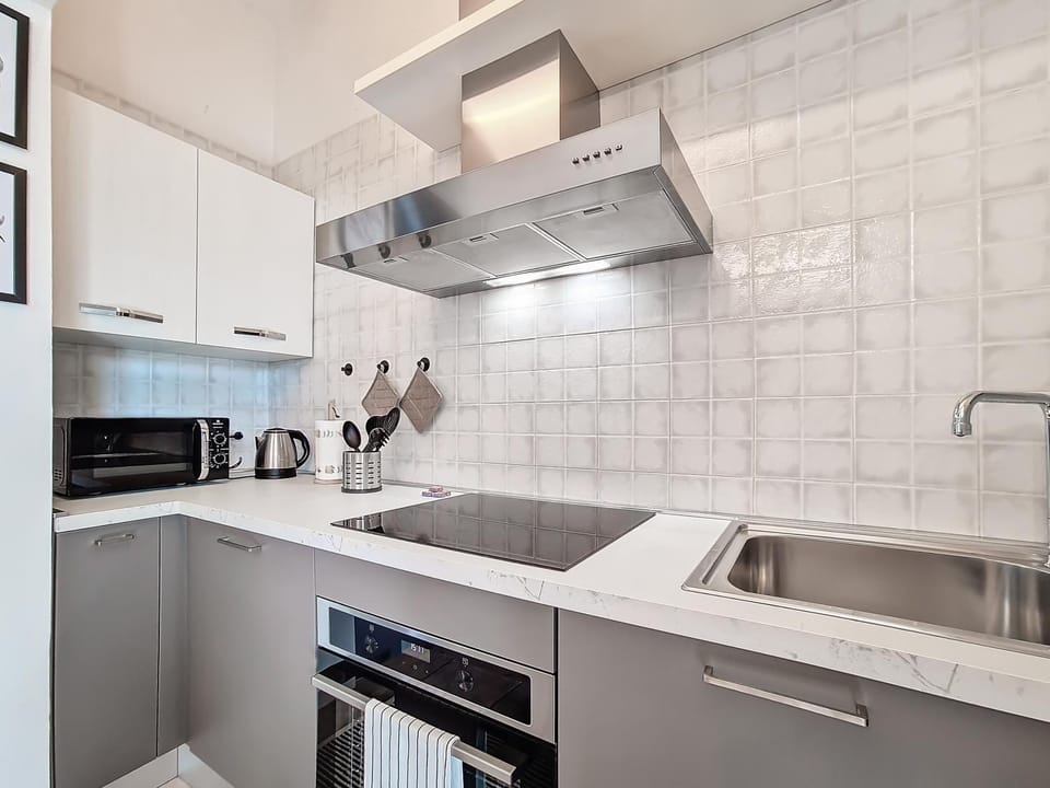 Kitchen or kitchenette, stove
