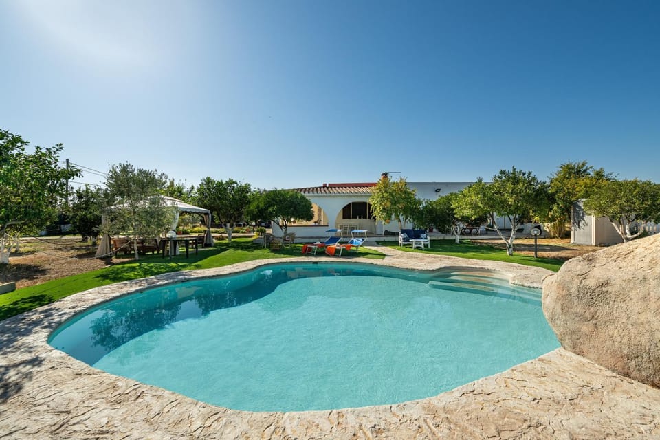 Property building, Living room, Swimming pool