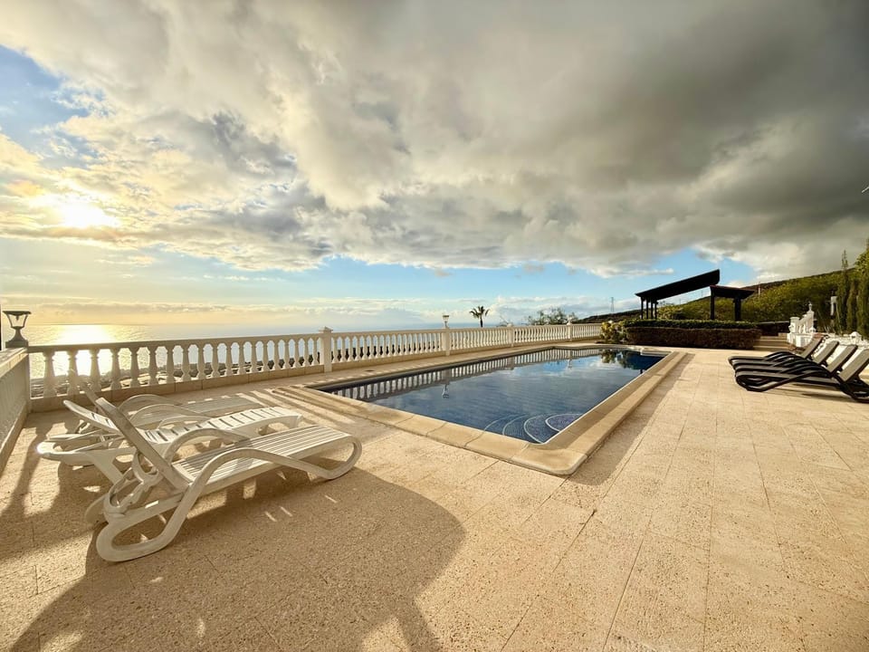 Property building, Living room, Swimming pool