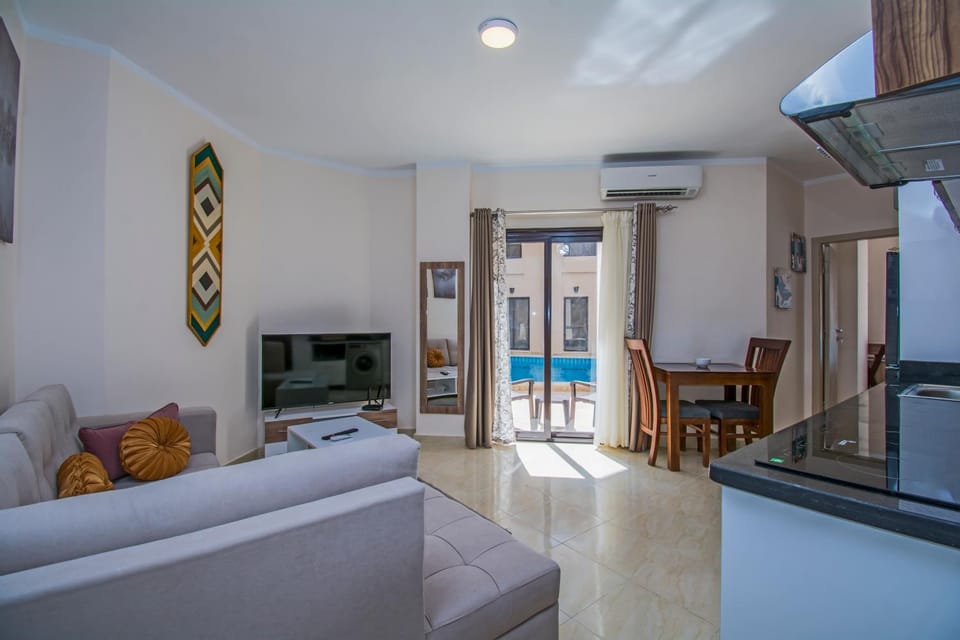 TV and multimedia, Kitchen or kitchenette, Living room, Photo of the whole room, Dining area, air conditioner