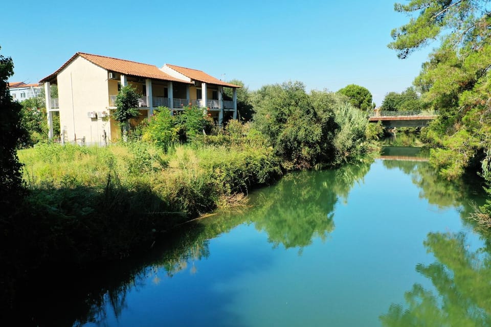 Property building, Natural landscape, Fishing, Garden, River view