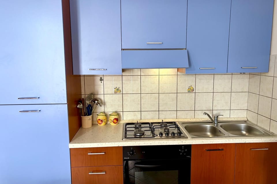 Kitchen or kitchenette, stove