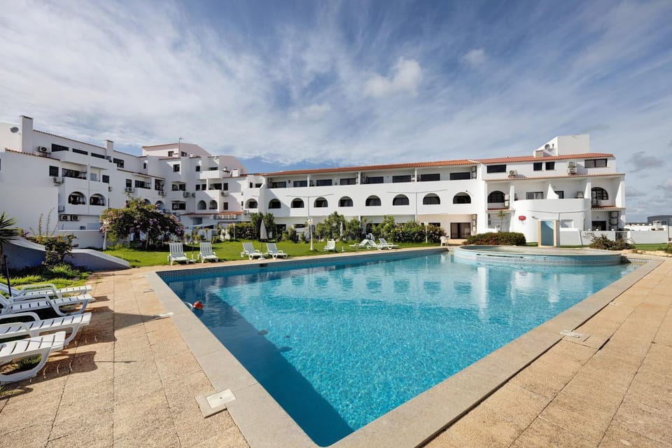 Property building, Living room, Swimming pool