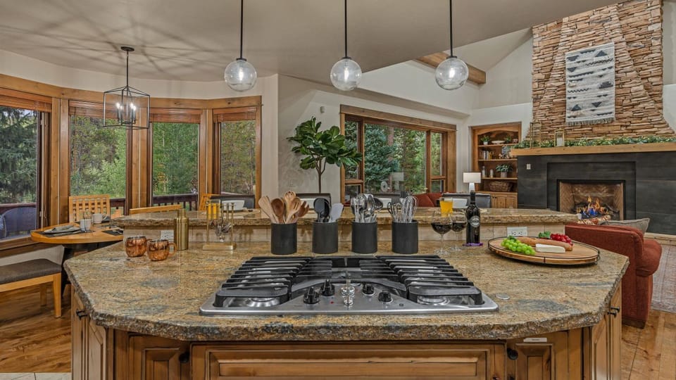 Dining area, fireplace, stove, kitchen