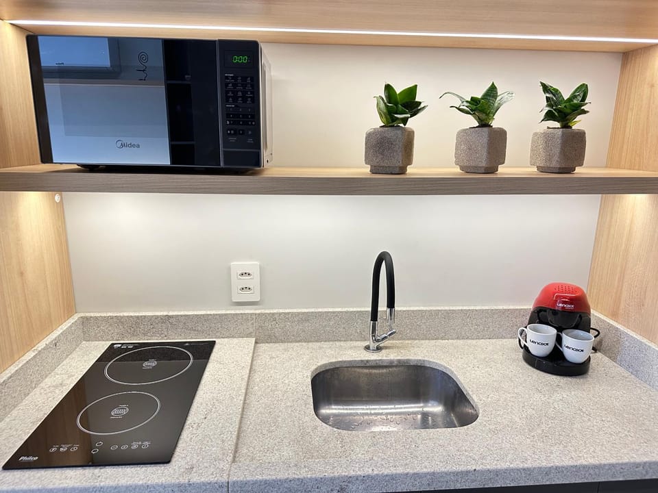 Kitchen or kitchenette, stove