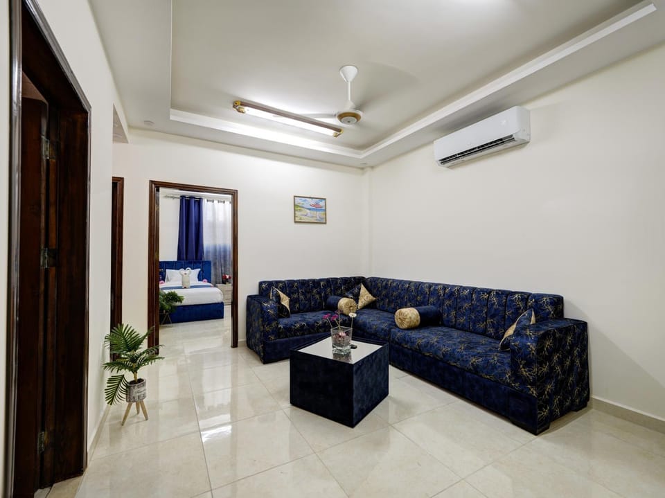 TV and multimedia, Living room, Seating area, fireplace, air conditioner