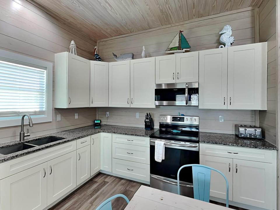 Kitchen or kitchenette, furniture, microwave, oven, stove, kitchen