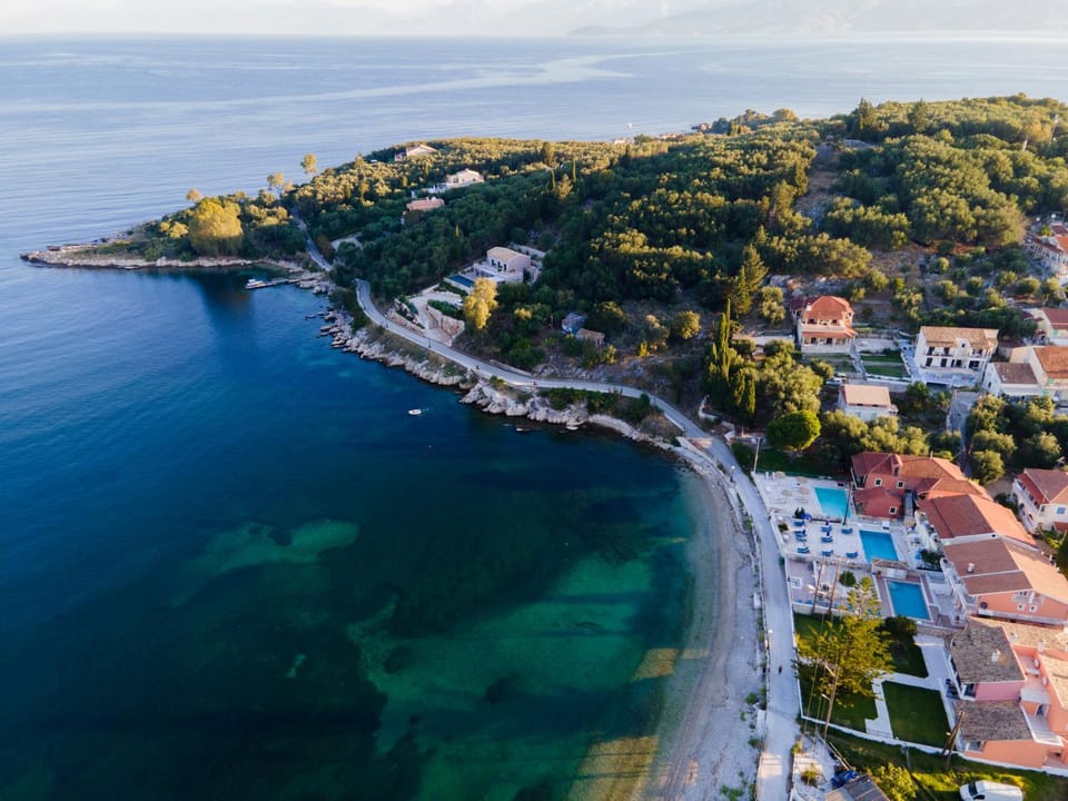 Property building, Neighbourhood, Natural landscape, Beach, Sea view