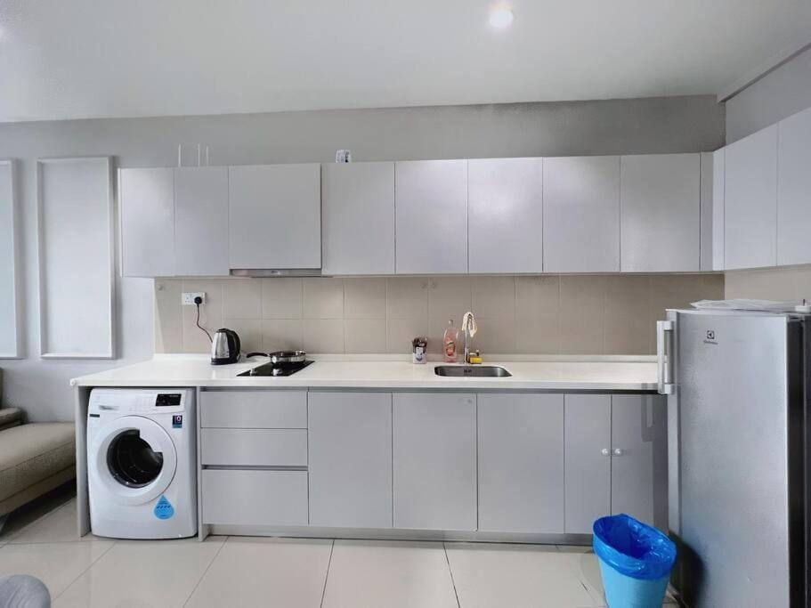 Kitchen or kitchenette, dishwasher, washing machine, dryer