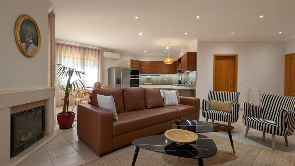 Living room, fireplace, kitchen