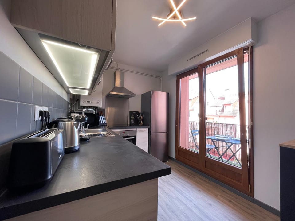 Kitchen or kitchenette, oven, stove, toaster