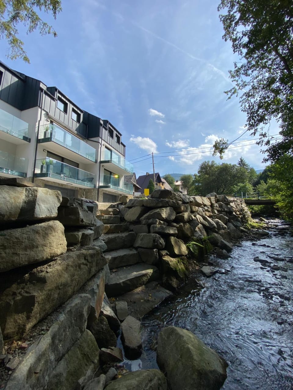 Property building, Nearby landmark, Natural landscape, Mountain view, River view