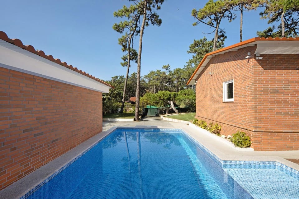 Property building, Living room, Swimming pool