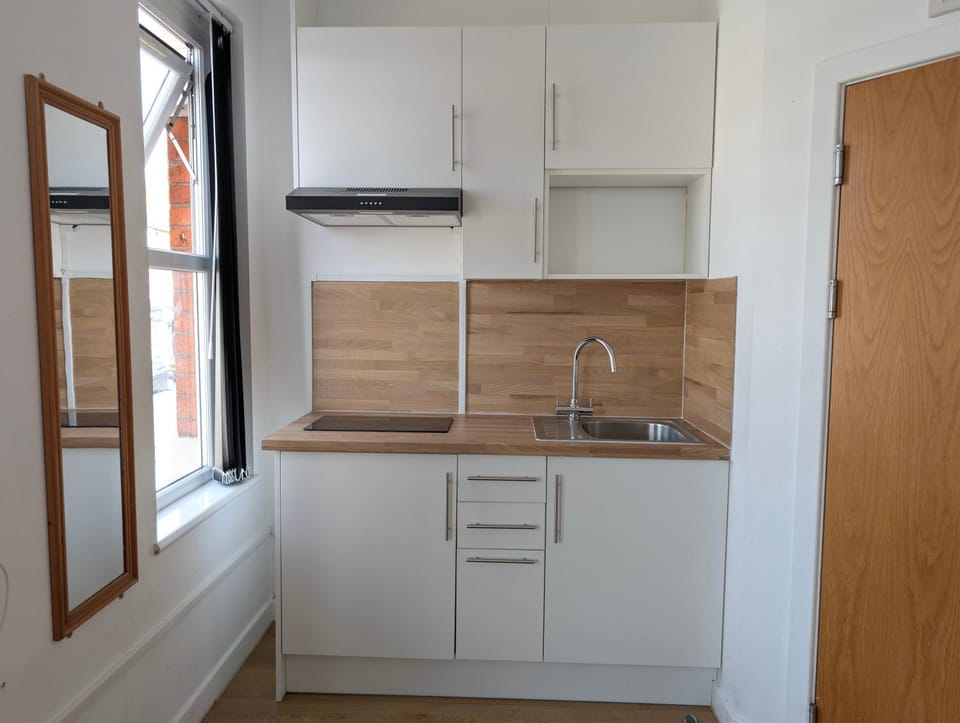 Kitchen or kitchenette, stove