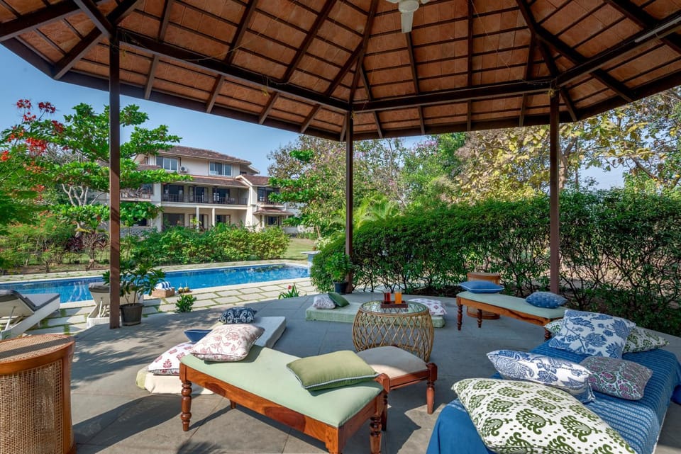 Property building, Patio, Day, Seating area, Pool view, Swimming pool, sunbed