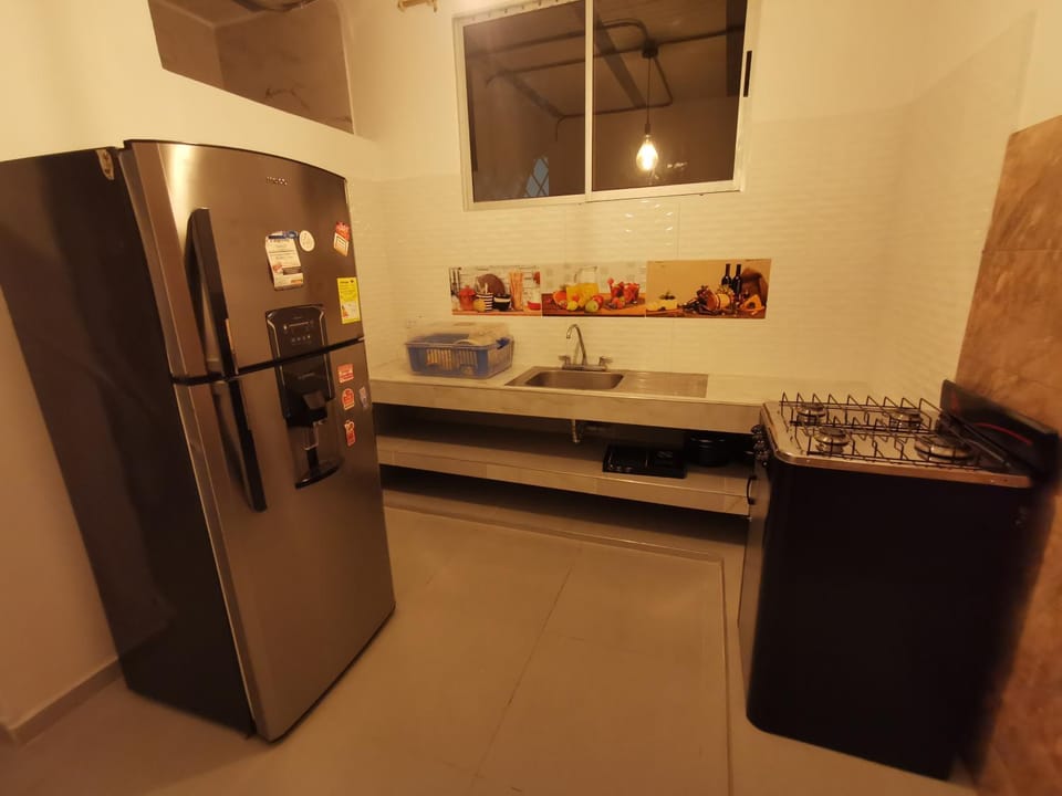 Kitchen or kitchenette, oven, stove