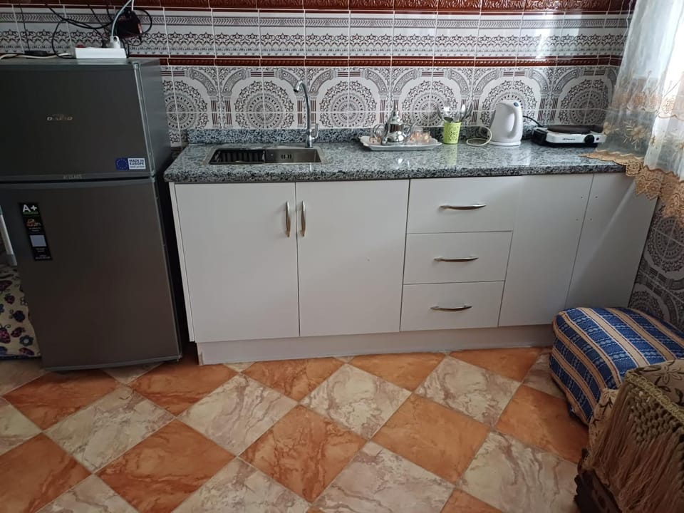 Kitchen or kitchenette, oven, stove