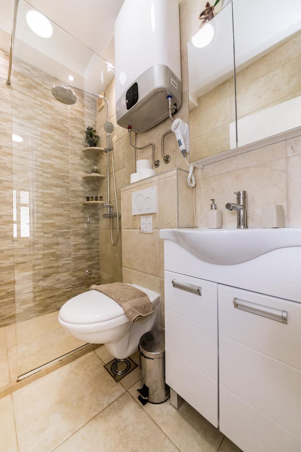 Shower, Toilet, Bathroom, hair dryier, towels