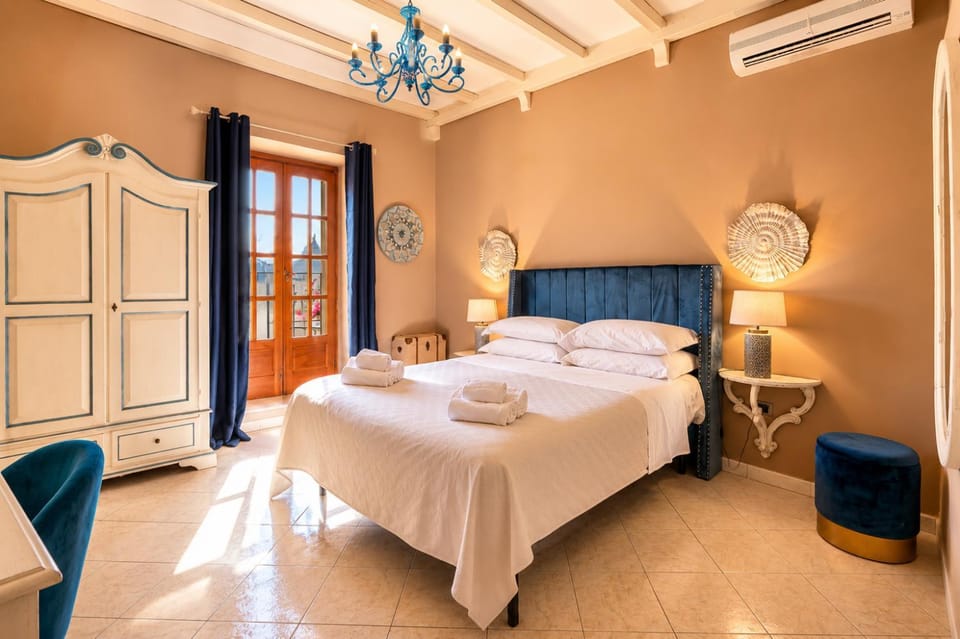Bed, Bedroom, towels, wardrobe, air conditioner