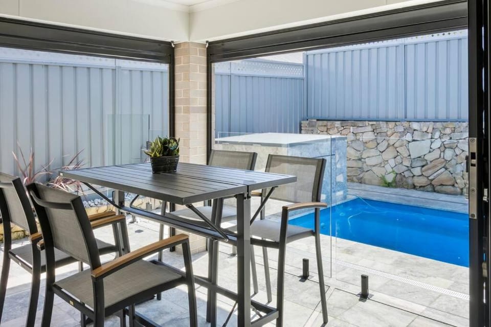 Patio, Dining area, Pool view, sunbed