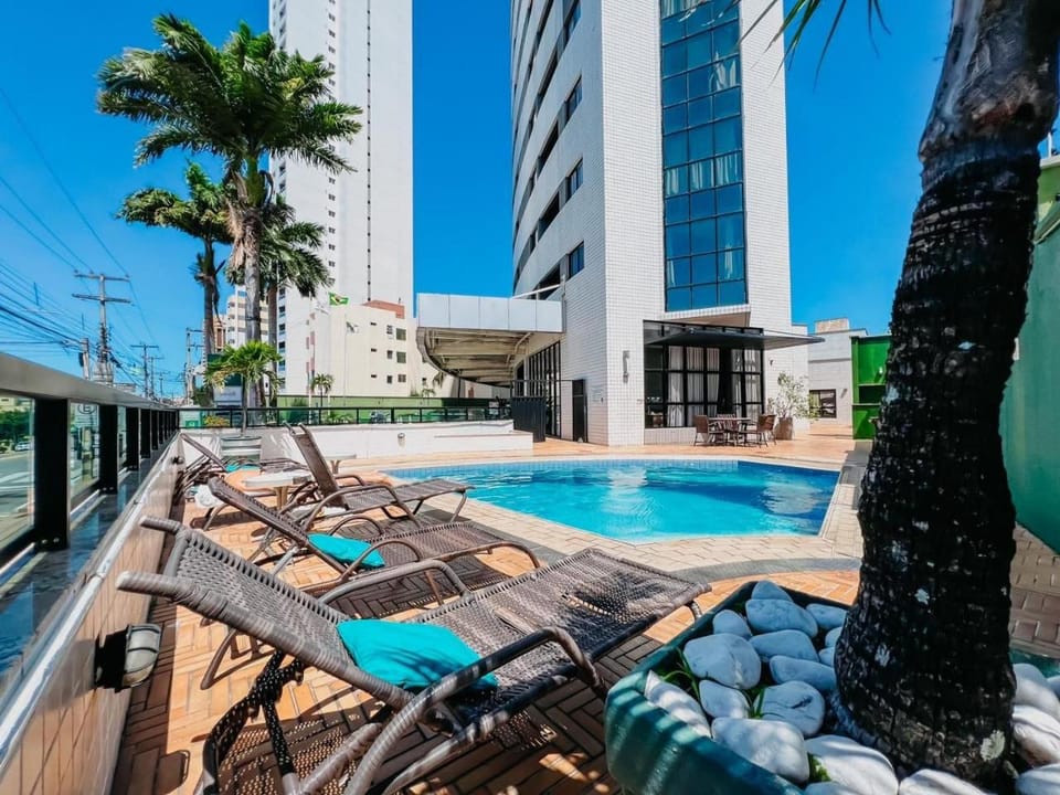 Property building, Swimming pool, sunbed