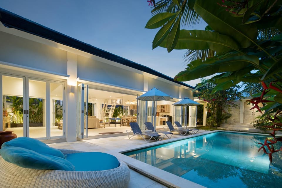 Night, Natural landscape, Living room, Seating area, Pool view, Swimming pool, sunbed