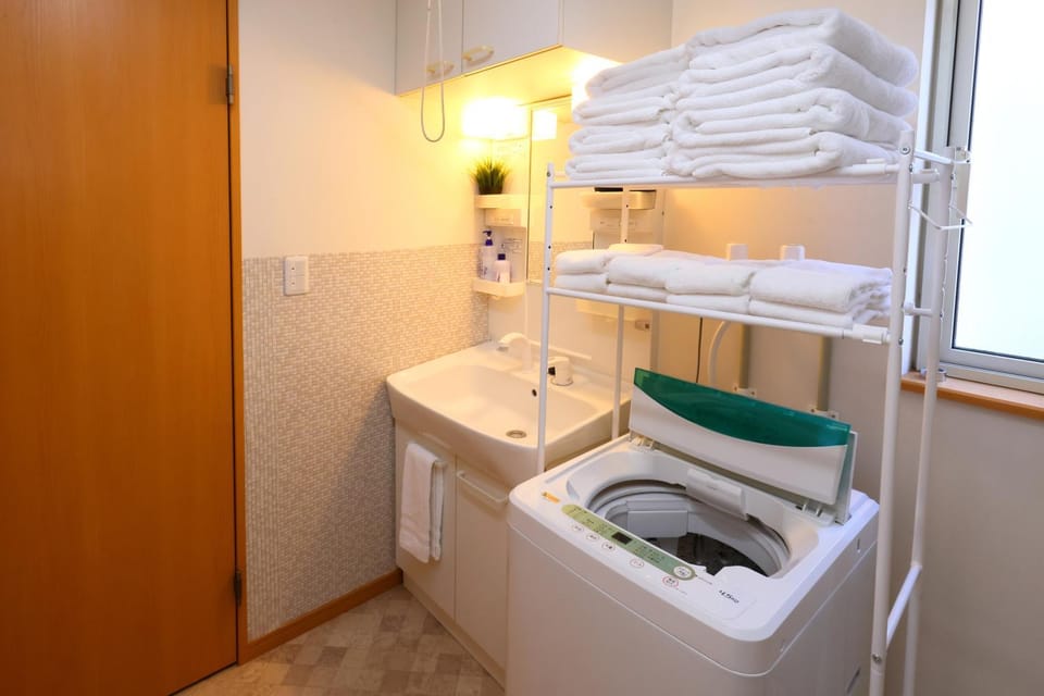Bathroom, towels, washing machine