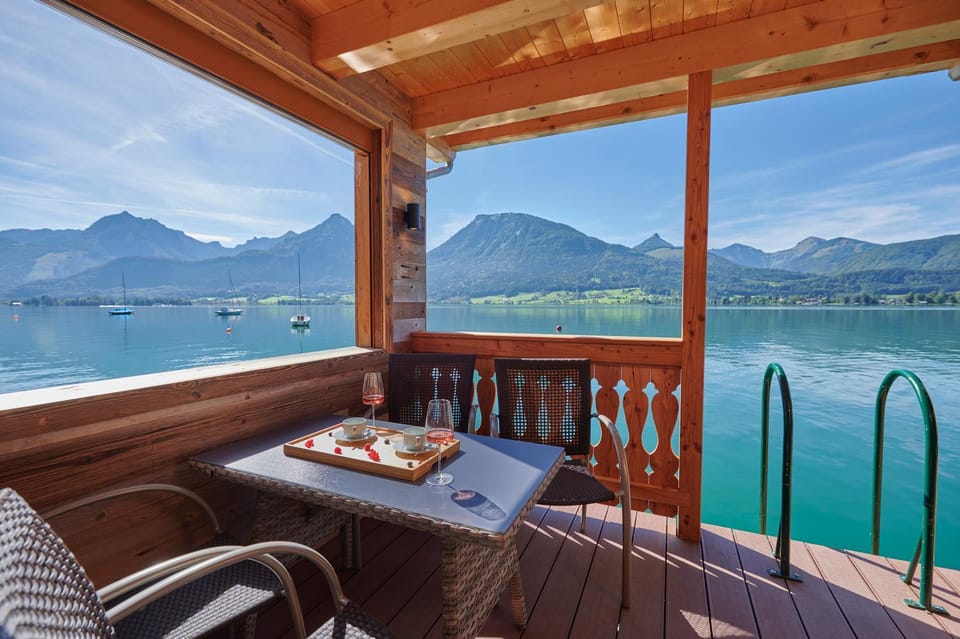 View (from property/room), Balcony/Terrace, Seating area, Dining area, Lake view