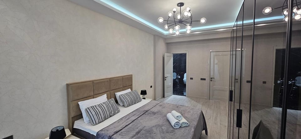 Bed, Photo of the whole room, Bedroom, towels, wardrobe