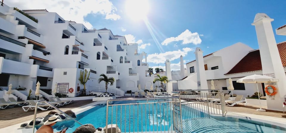 Property building, Pool view, Swimming pool, sunbed