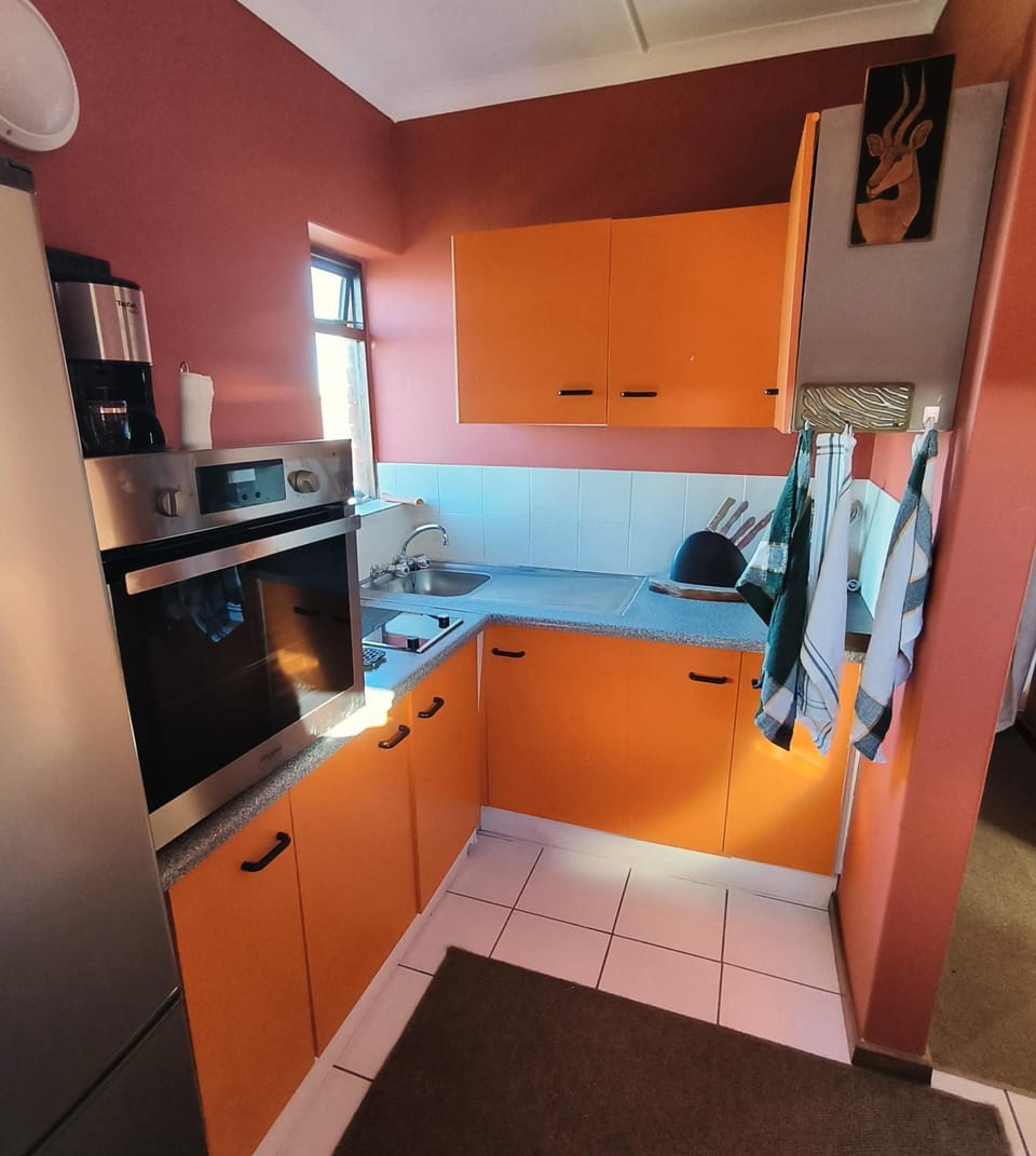 Photo of the whole room, oven, stove, kitchen