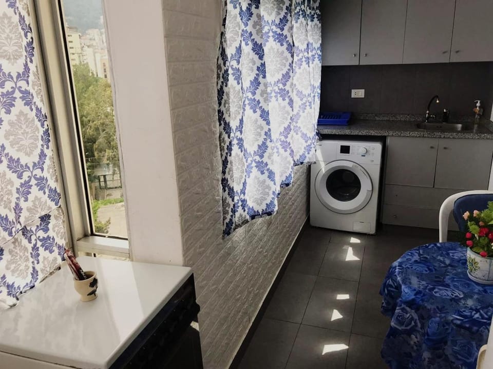 Seating area, laundry, washing machine, kitchen