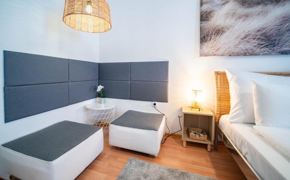 Bed, Living room, Seating area, Bedroom
