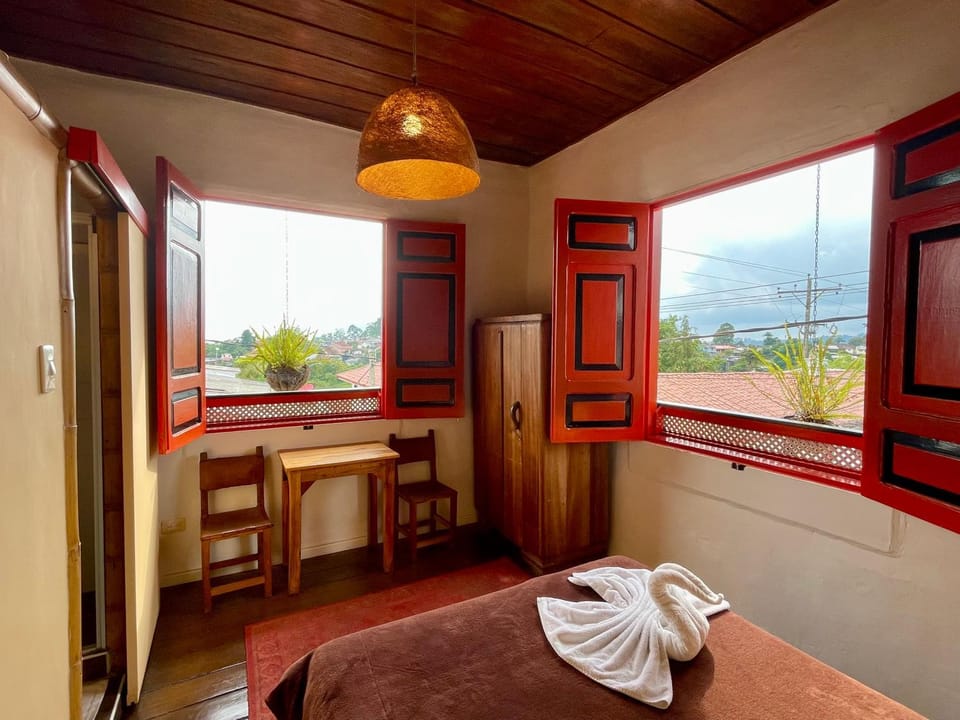 Bed, Photo of the whole room, Seating area, towels, wardrobe