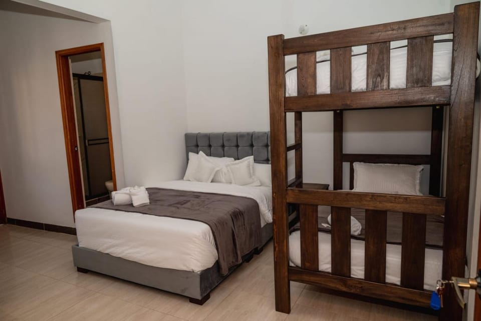 Bed, Photo of the whole room, Bedroom, bunk bed, towels