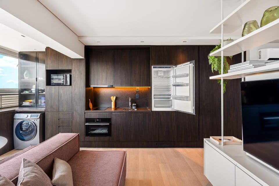 Kitchen or kitchenette, stove, washing machine, dryer