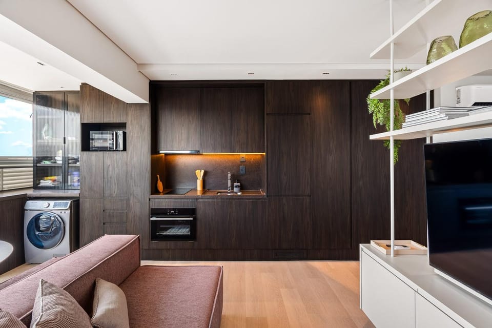 Communal lounge/ TV room, TV and multimedia, Kitchen or kitchenette, Living room, Seating area, oven, washing machine, dryer