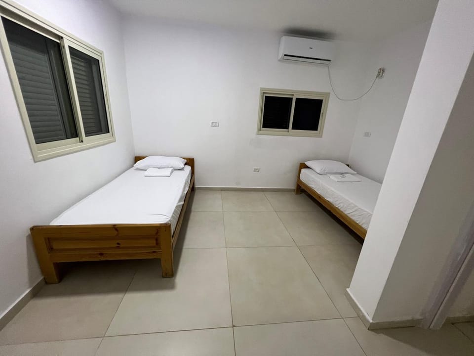 Bed, air conditioner