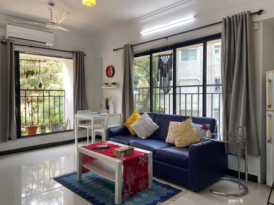 View (from property/room), Living room, Seating area, Dining area, air conditioner