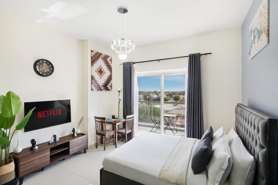 Stylish Sports City Studio Golf View PoolGym Apartment in Dubai