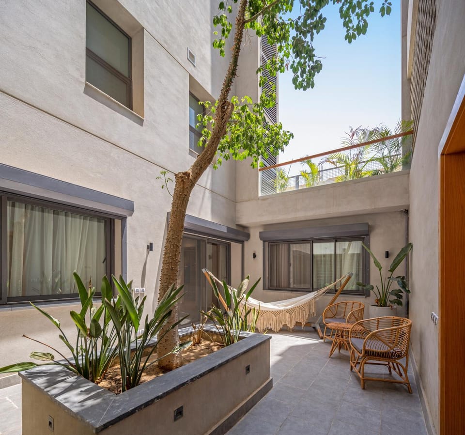 Property building, Patio, Day, Seating area