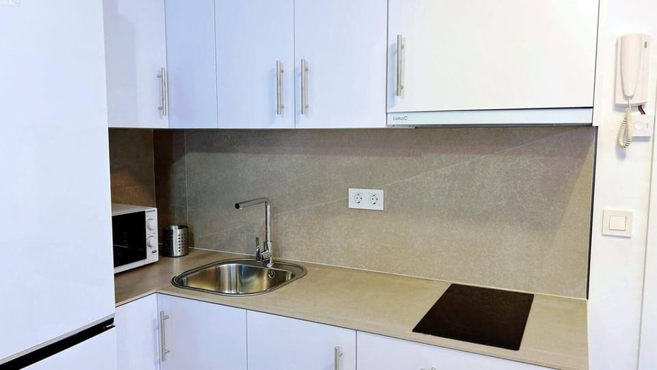 Kitchen or kitchenette, stove