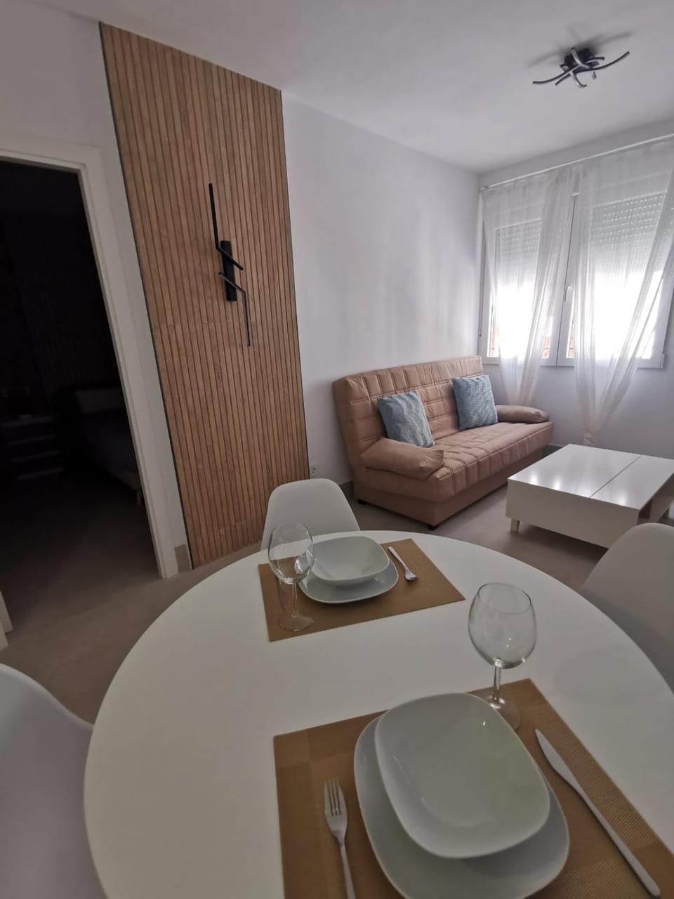 Bed, Living room, Seating area, Dining area