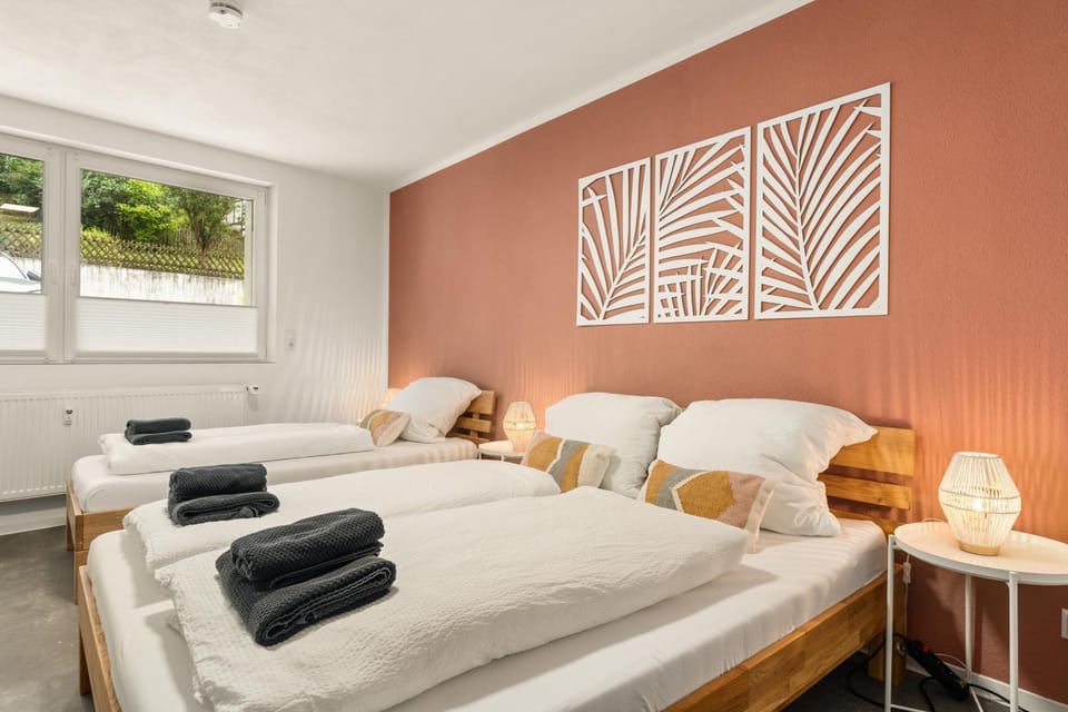 Bed, cot, flat iron, storage, towels