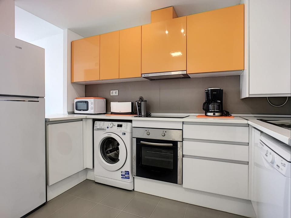 Coffee/tea facilities, Kitchen or kitchenette, dishwasher, microwave, oven, stove, toaster, washing machine