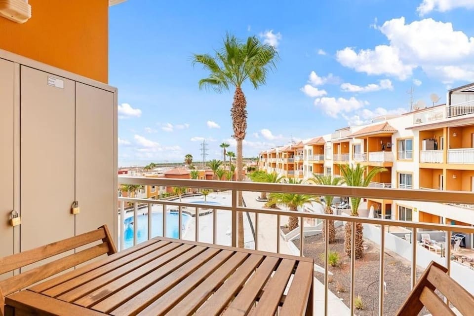 Property building, Patio, Day, View (from property/room), Balcony/Terrace, Pool view, Swimming pool, sunbed