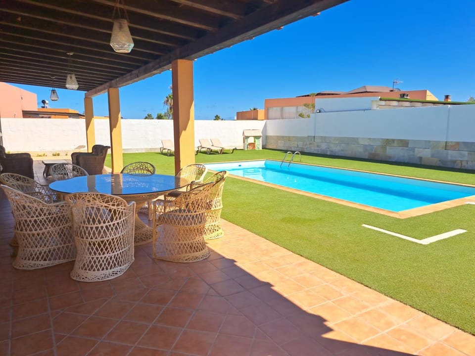 Patio, Day, Garden, Balcony/Terrace, Pool view, Swimming pool, sunbed