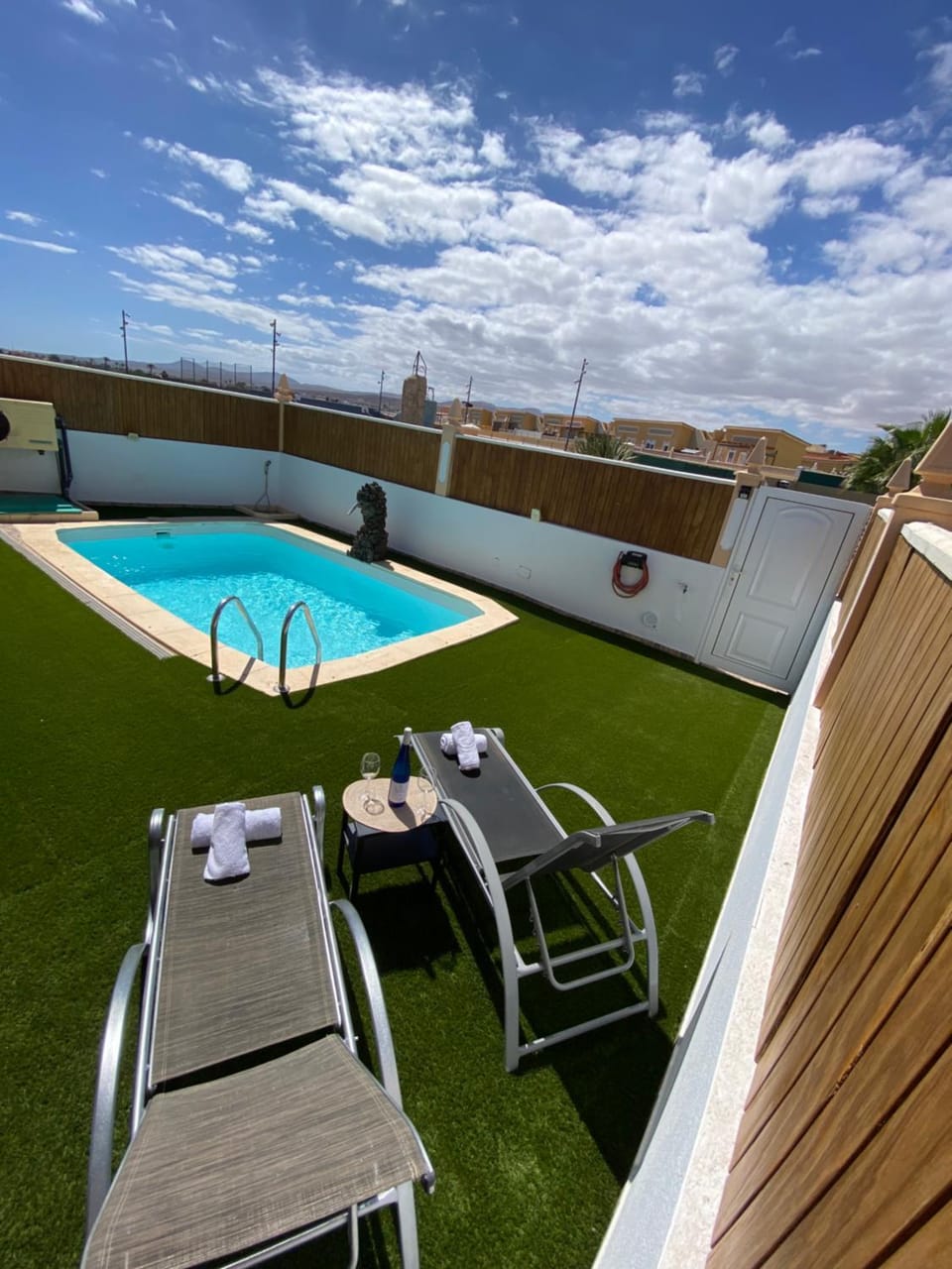 Patio, Day, Natural landscape, Pool view, Swimming pool, sunbed