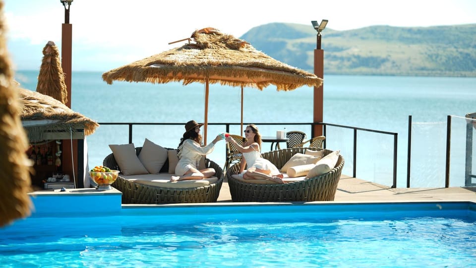 Patio, Nearby landmark, Day, People, Natural landscape, Guests, Lake view, Mountain view, Pool view, River view, Sea view, Swimming pool, group of guests, sunbed
